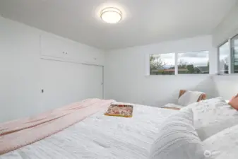 Bedroom one with a large closet and great corner windows.