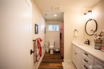Main bathroom with built in storage and double sinks