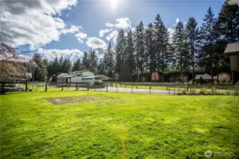 3 stall barn with covered parking area