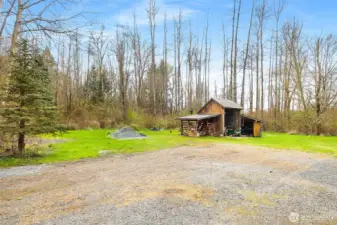 Tractor and woodshed.