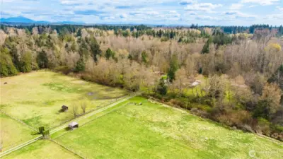 2 large fields - one on each side of driveway entrance.