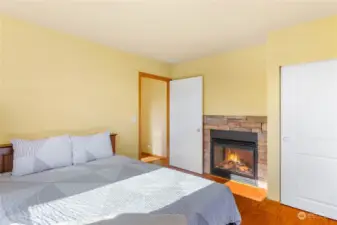 Fireplace in main bedroom, acts as a second suite