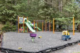Multiple playgrounds and park areas throughout.