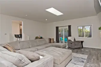 spacious family room w slider to backyard
