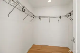 Primary bedroom walk-in closet.