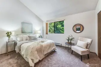 The upstairs also has a second bedroom with vaulted ceilings.