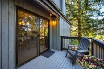 Spend peaceful evenings on this large deck located off the living room.