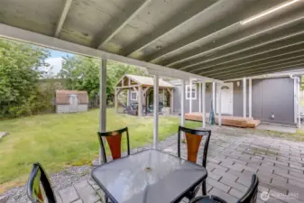 Overhang additional area adjacent to detached structure