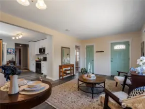Sit back and relax while the cook is cooking up a meal in the white-on-white kitchen.