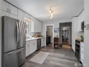 This kitchen has room for a small table or roll-away island if you desire to have a second eating space.