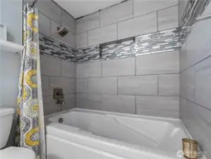 Soak in the tub or take a nice shower, whatever your fancy; this bathroom will accommodate.