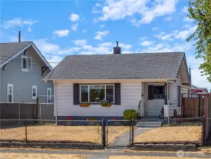 Fully fenced yard. Sidewalks and curbs.