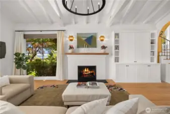 Custom built cabinetry is great for storage and hides your tv.