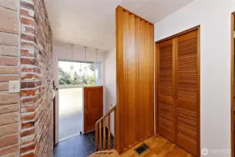 Mid-Century split entry home with beautiful brick and warm wood accents.