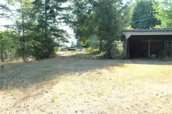 Adjacent lot in the back yard alley.