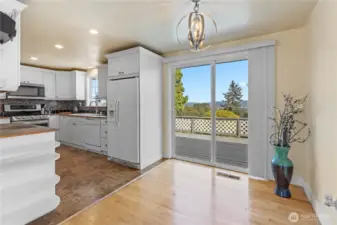 Dining area with sliding door leading to backyard