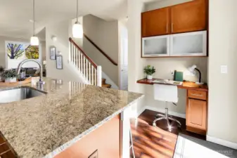 Just off the kitchen is your command center. Just to the right of this photo is the backyard, garage, and extra parking space.