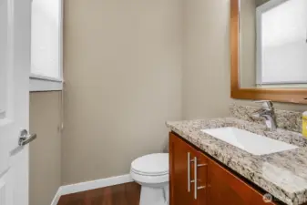 Freshen up in the main floor powder room.