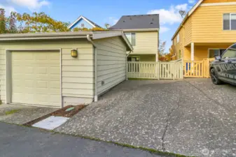 Detached garage with 2nd parking space off of wide alley steps from the Link Light Rail Station.