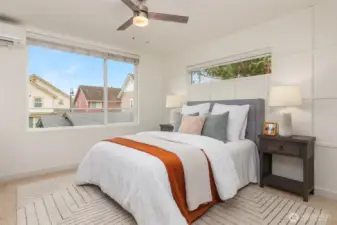 Spacious primary bedroom suite.