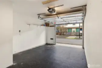 A view from inside the garage, with electric door opener.