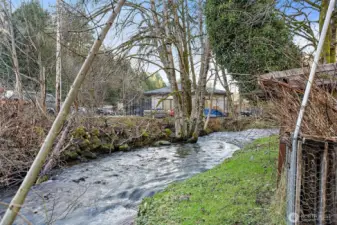 Enjoy the soothing sounds of the salmon-bearing creek in your own backyard.