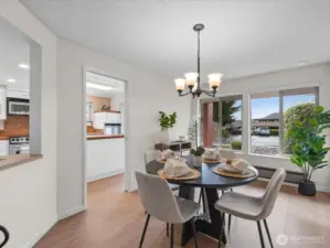 Formal dining room has a slider that opens up to the oversized patio.