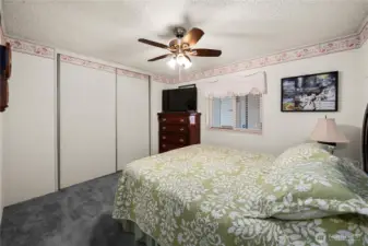 Comfortable guest bedroom provides flexibility for visitors, hobbies, or quiet relaxation.