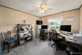 Versatile 3rd bedroom w/large closet works perfectly as a home office, craft space, or additional guest area.