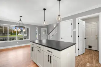 Laundry, garage, and walk-in pantry straight ahead