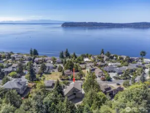Located in the heart of the coveted Chennault Beach neighborhood. The home looks due west to Possession Point on Whidbey Island, across the shipping lanes of Admiralty Inlet to the Olympic Range in the distance.