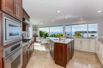 Enjoy the view from every location in the island kitchen. All new flooring, cabinets, counters & appliances.