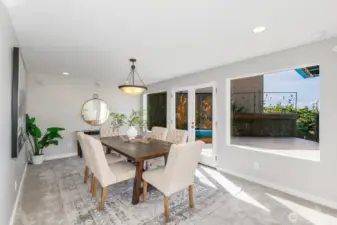 This room can be a formal dining room or a family room.