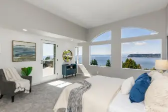 You can lay in bed and enjoy the views! Possession Point, the south tip of Whidbey Island, is front and center. The door goes from the primary bedroom to the view deck.