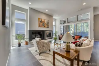 Family room with transom windows allows so much natural light.