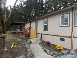 Walk way to your covered back patio.