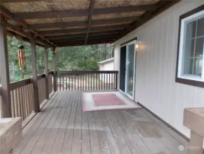 Covered back patio great for entertaining.