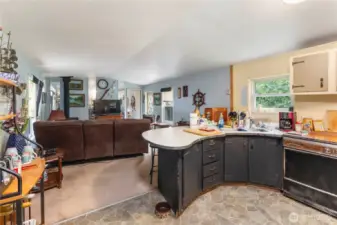 This Light and bright home offers an open floor plan and has vinyl windows throughout and a metal roof that was new in 2014.