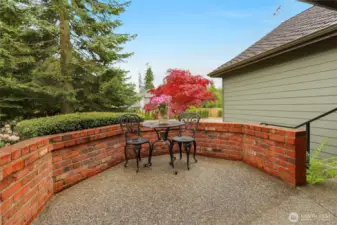 The French doors in the kitchen lead directly to the front patio. This spot is ideal for an early morning coffee or a quick snack at lunchtime.