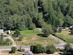 Corner lot with 12 more attached acres to explore.