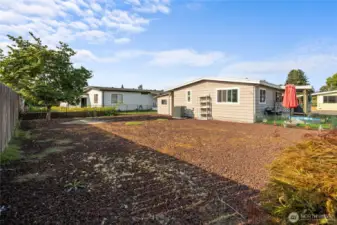 Back yard is large and ready for your garden beds, extra storage shed or expand the one your have!