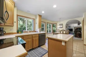 Bright and open.  Hard Counter tops and tile floor