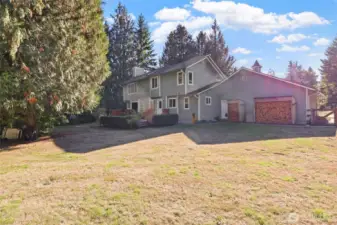 Fully fenced rear yard-cordwood stays