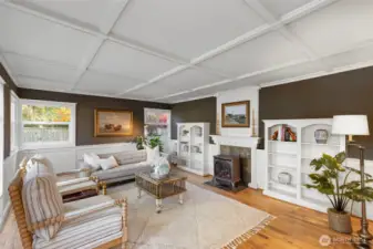 Hardwood floors, wainscoting, and furniture quality built-ins throughout.