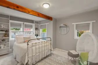 Guest bedroom. Stay toasty all winter with electric heat, and a freestanding stove.