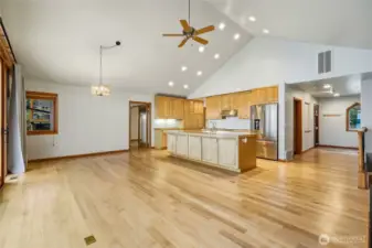 Gourmet kitchen w/ custom cabinetry, Island & new appliances.