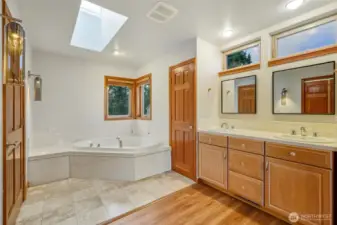 Featuring a Dual vanity, Soaking Tub & additional closet space…