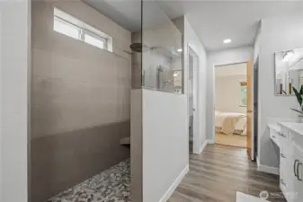 Luxury primary bathroom with walk-in shower.