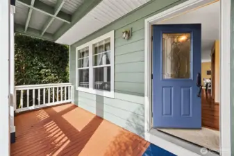 Covered Front Porch is great for enjoying the beautiful views of the pocket park in front of house.