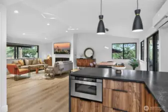 Honed countertops and waterfall edge at the breakfast bar kitchen island.